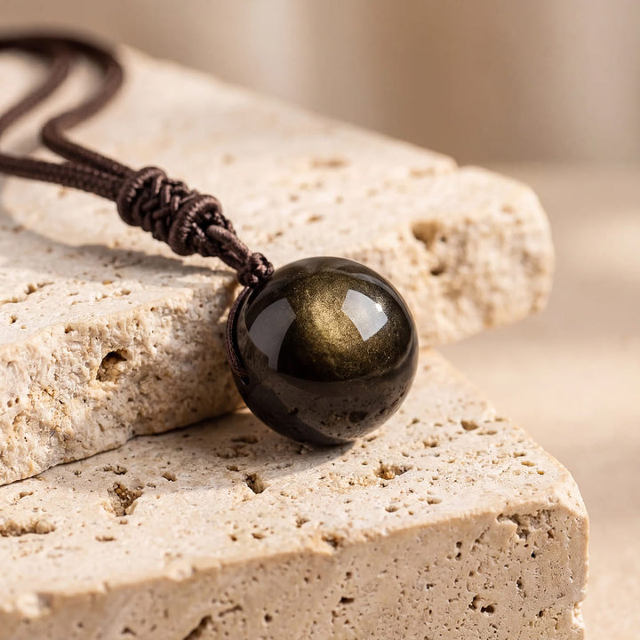 Rustiva™ | Rustgevende Gouden Obsidiaan Hanger